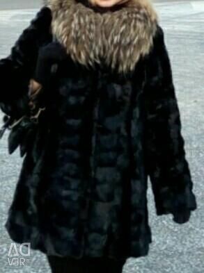Fur coat made of pieces of mink of size 44-46